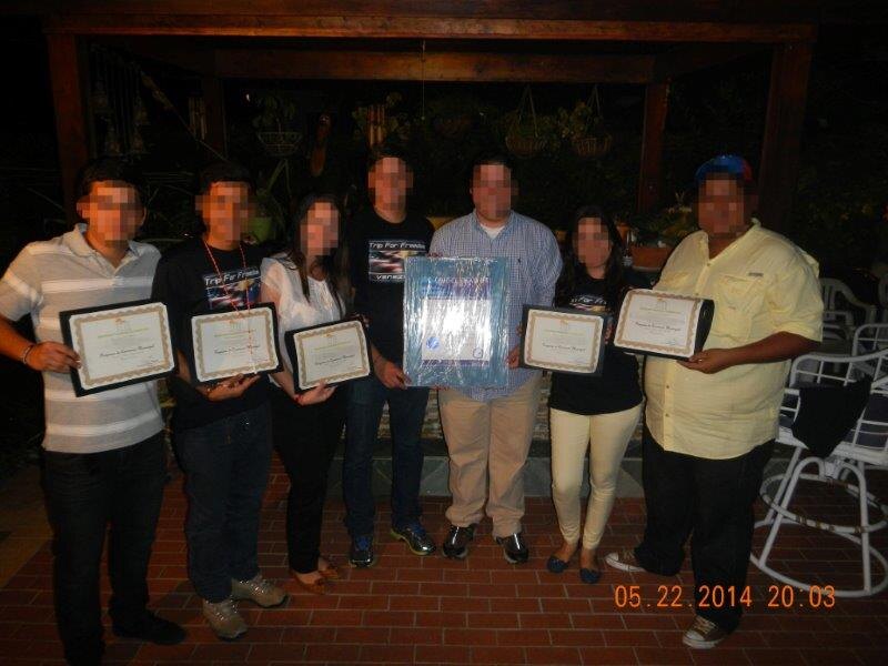 EF4D participants displaying their program completion certificates